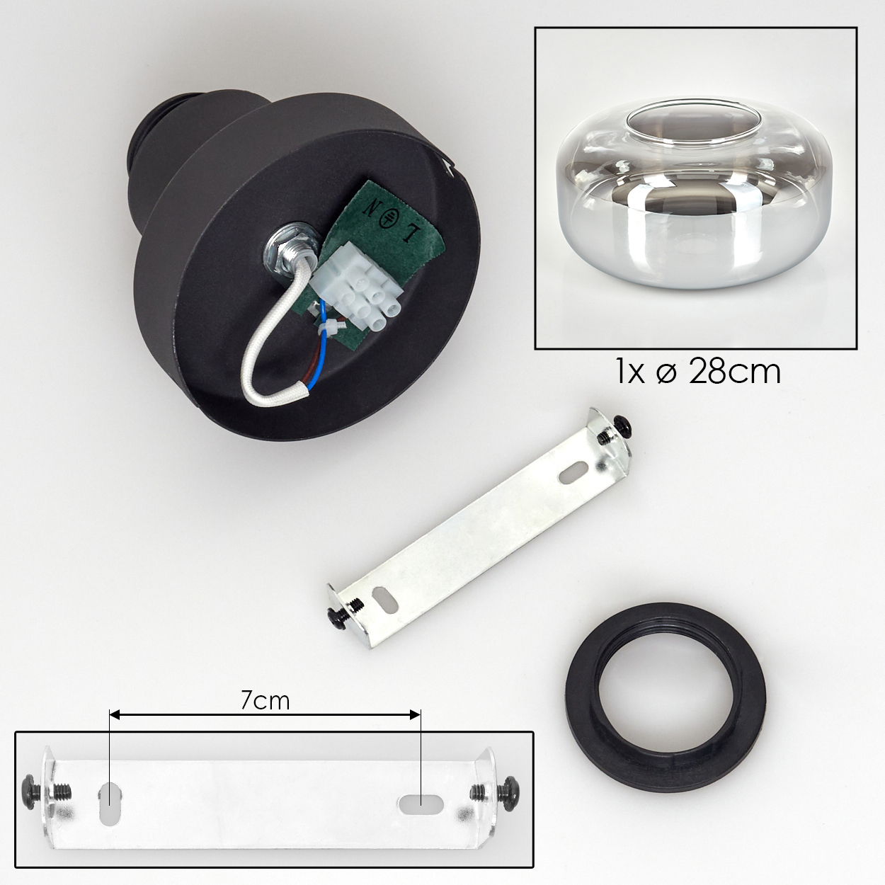 Draufsicht auf eine zerlegte Lampe. Zu den Komponenten gehören ein schwarzer Sockel, ein silbernes Licht, eine Metallhalterung und ein Gummiring.