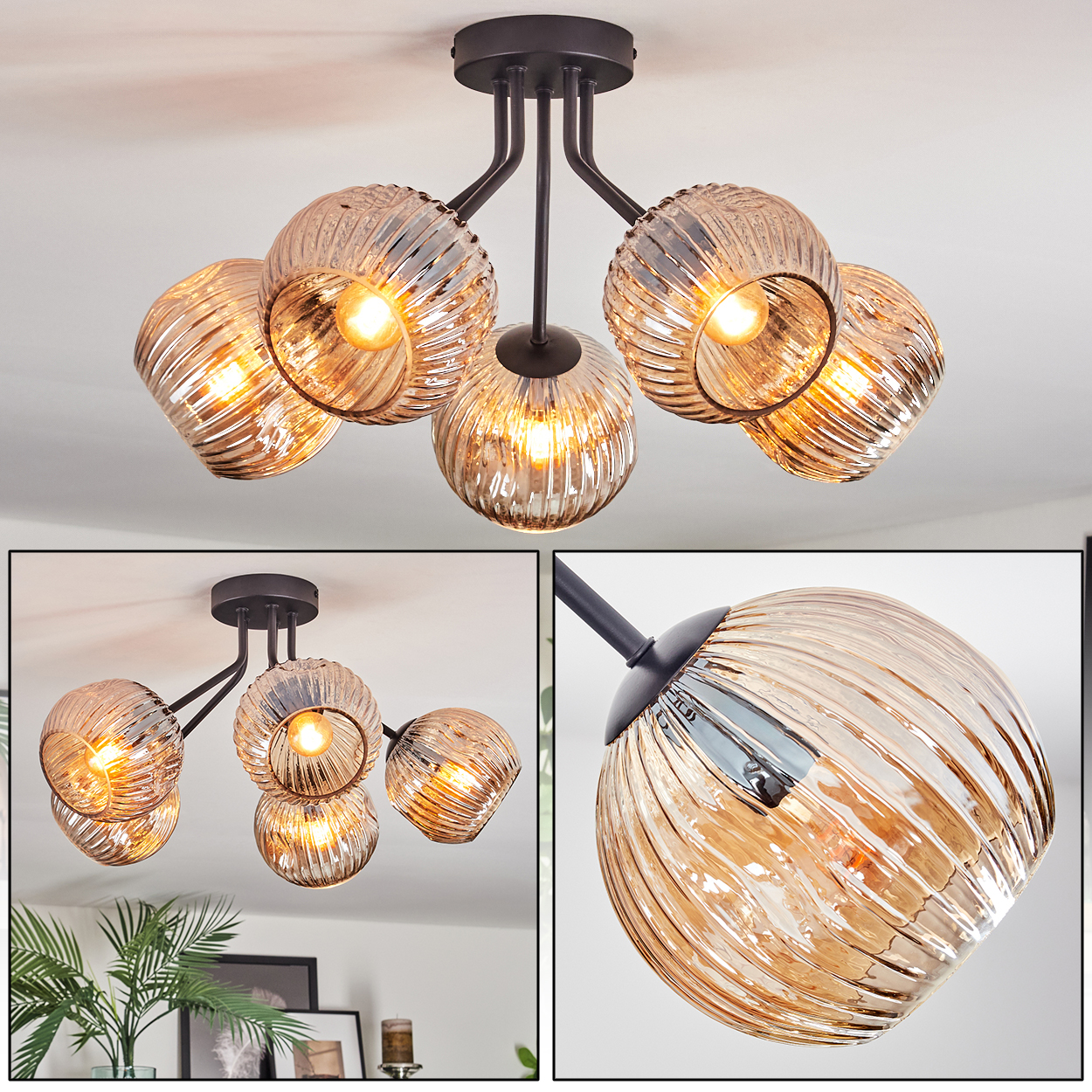 Moderne Deckenlampe mit sechs bernsteinfarbenen Glaskugeln. Die Lampe ist an einem schwarzen Metallrahmen an einer hellen Decke befestigt.