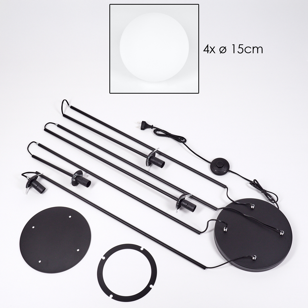 Eine zerlegte Lampe mit rundem Sockel, vier schwarzen Stangen und einem kreisförmigen weißen Licht. Komponenten sind auf weißer Oberfläche verteilt.