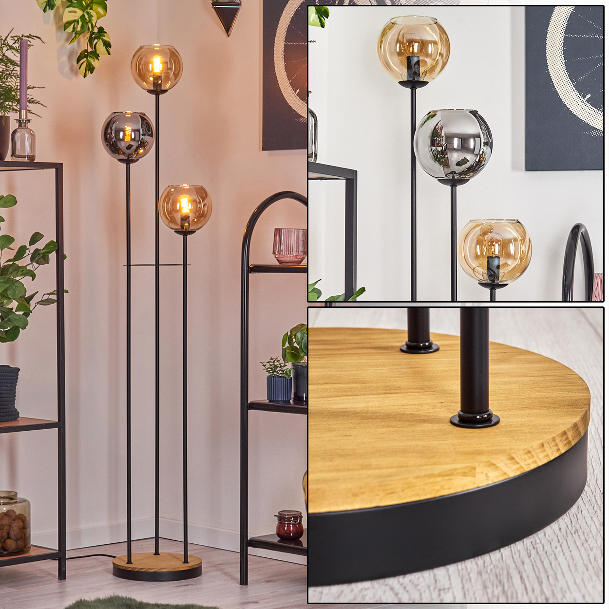 Eine Stehlampe mit drei Glaskugeln. Schwarzer Metallrahmen mit Holzsockel. Regale mit Pflanzen und Dekoration im Hintergrund.