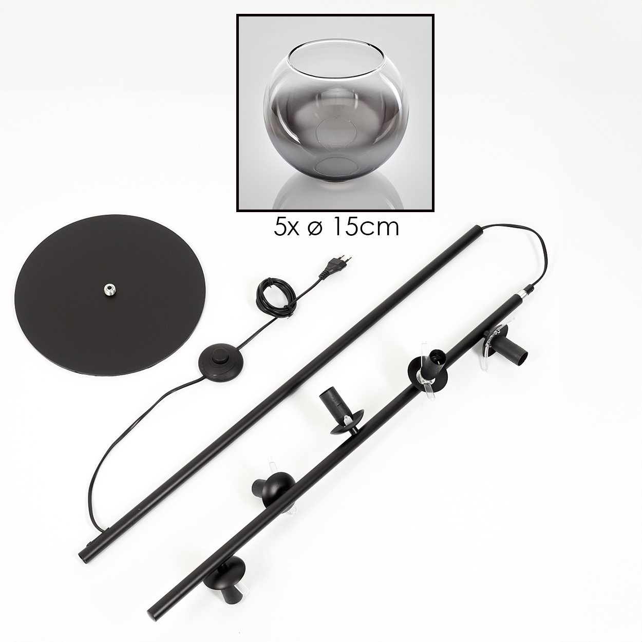 Eine zerlegte schwarze Stehlampe mit Glasschirm, Fuß und Röhren. Der Lampenschirm ist grau und der Fuß rund.