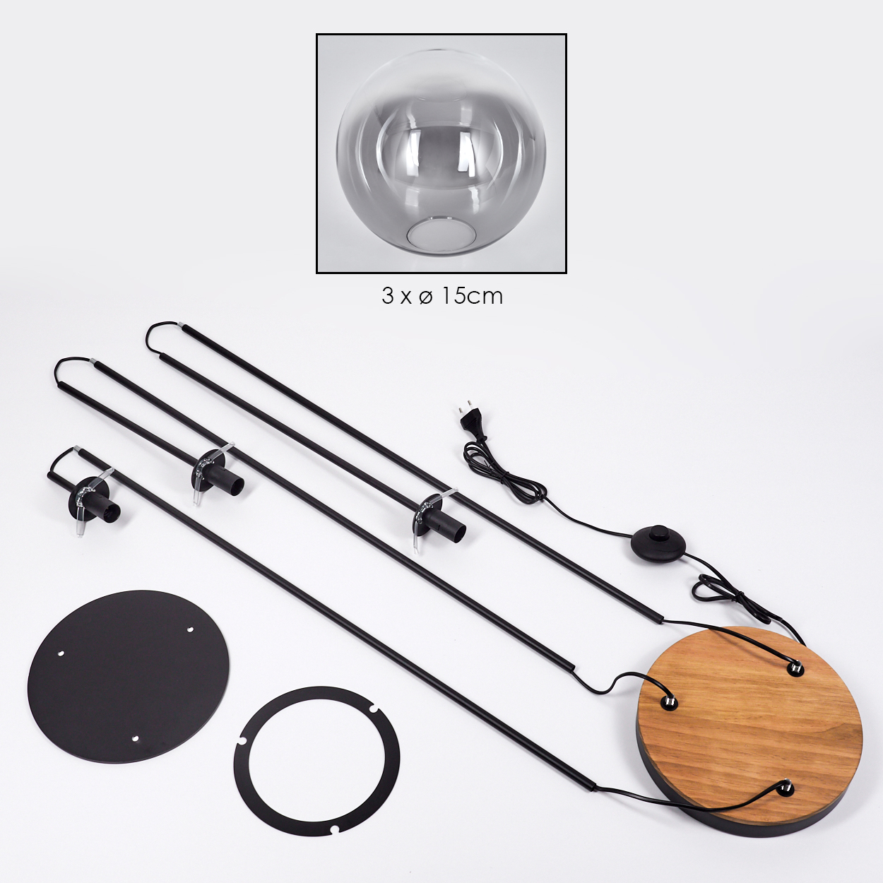 Zerlegte Lampenteile. Enthält Glaskugel, Metallstangen, Holzsockel, schwarze und kreisförmige Metallteile und elektrische Komponenten.