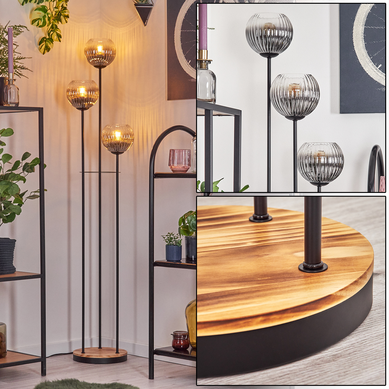 Eine Stehlampe mit drei Glaskugelschirmen. Der Sockel ist aus Holz und schwarzem Metall. Regale mit Dekorationen sind beidseitig.