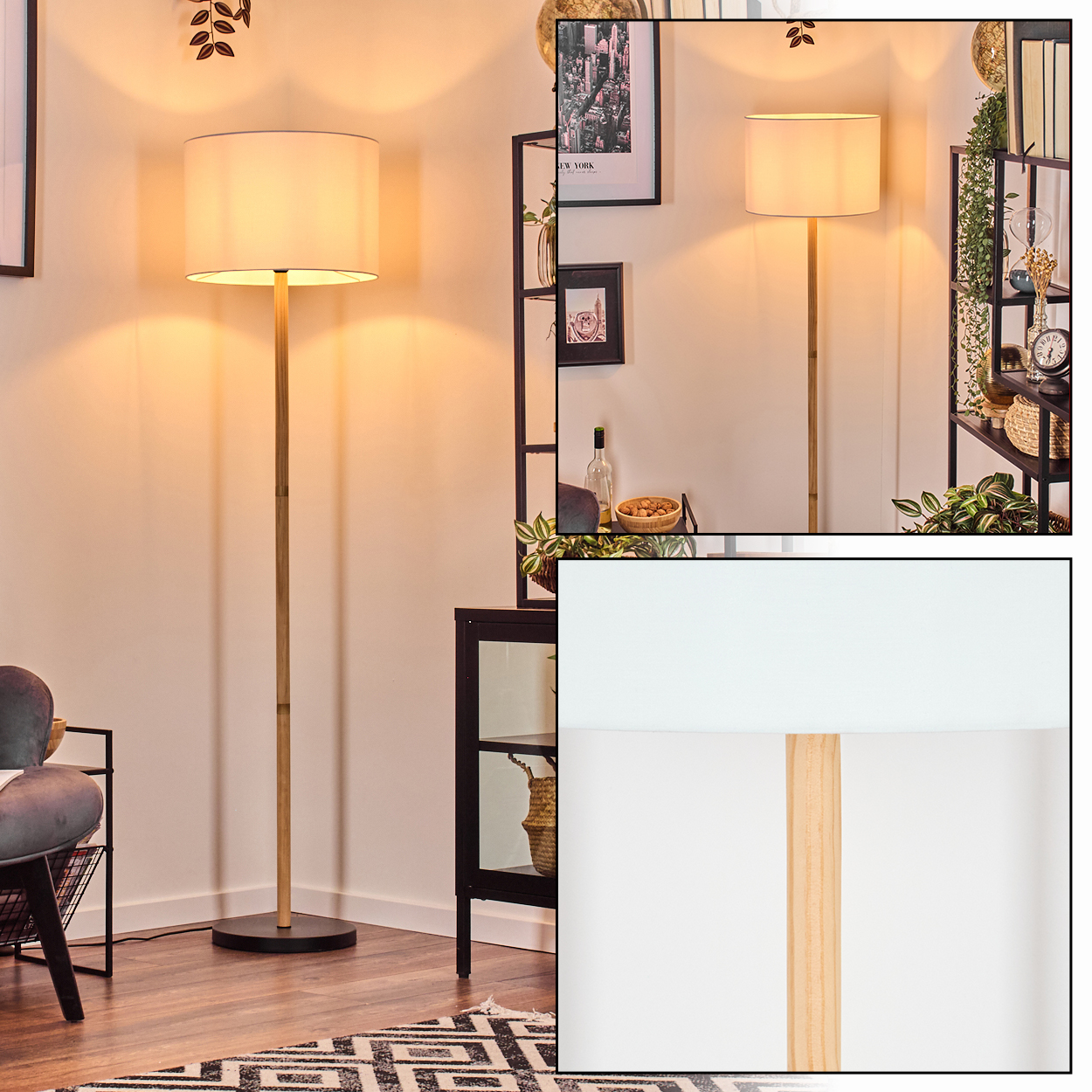 Eine Stehlampe mit beigem Lampenschirm und Holzstange steht in einem Raum. Der Raum hat ein schwarzes Regal, Kunst und einen gemusterten Teppich.