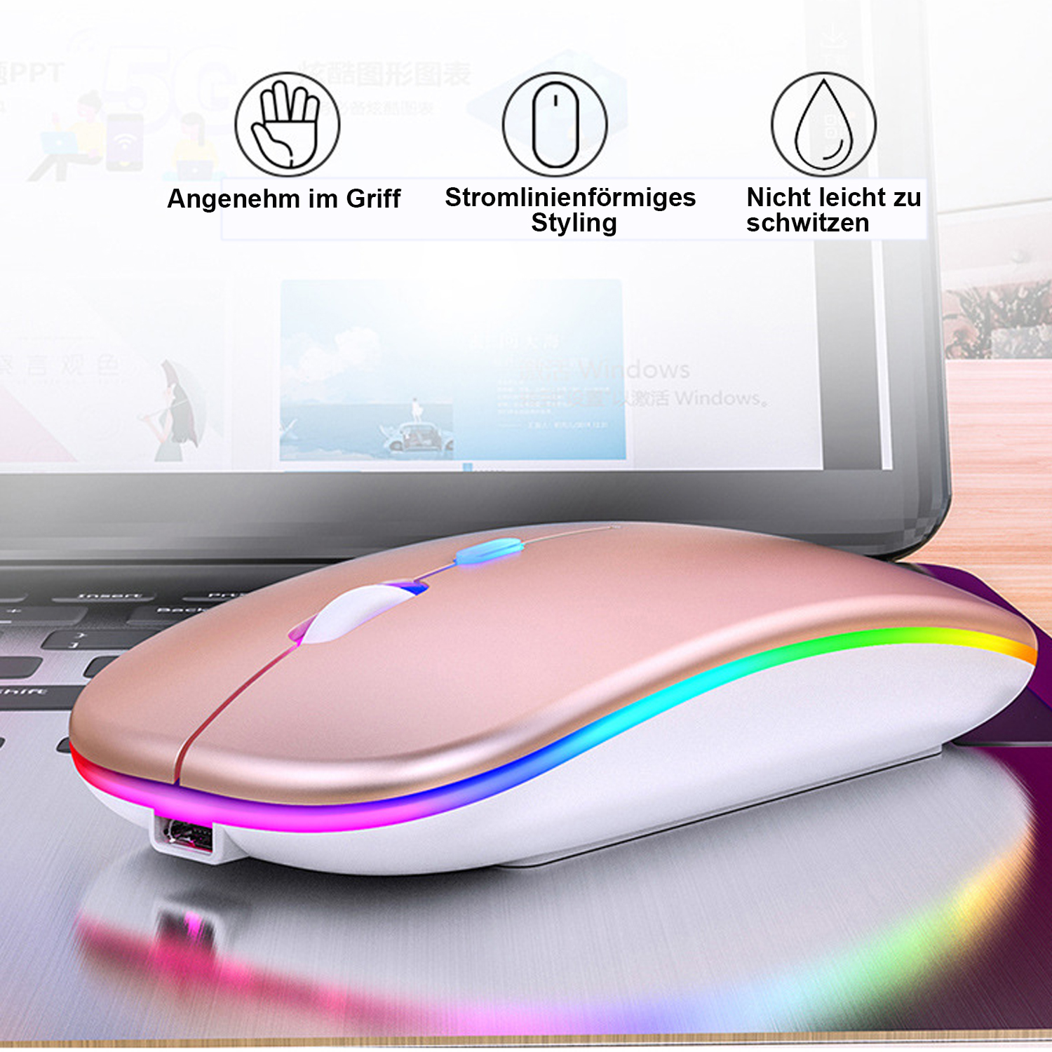 Eine roségoldene kabellose Maus mit einem farbenfrohen LED-Streifen befindet sich auf einer Laptop-Tastatur.