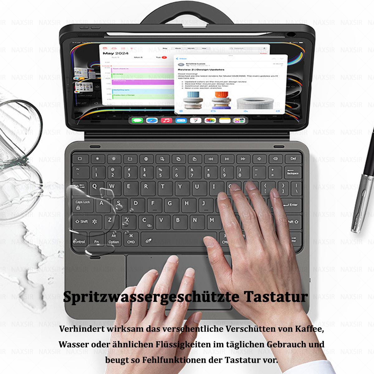 Ein Tablet mit Tastatur ist geöffnet. Hände liegen auf der Tastatur, der Bildschirm zeigt eine Webseite.