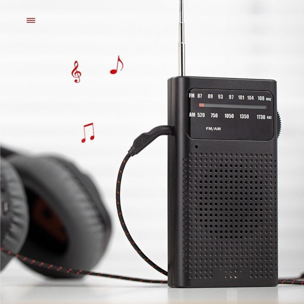 Ein schwarzes Radio mit Antenne, Kopfhörern und Noten. Das Radio hat einen Drehregler für UKW/MW-Sender.