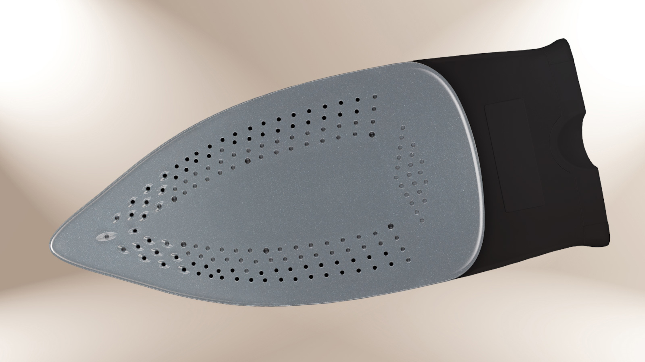 Szare żelazko z wieloma otworami na beżowej powierzchni, część jest czarna.