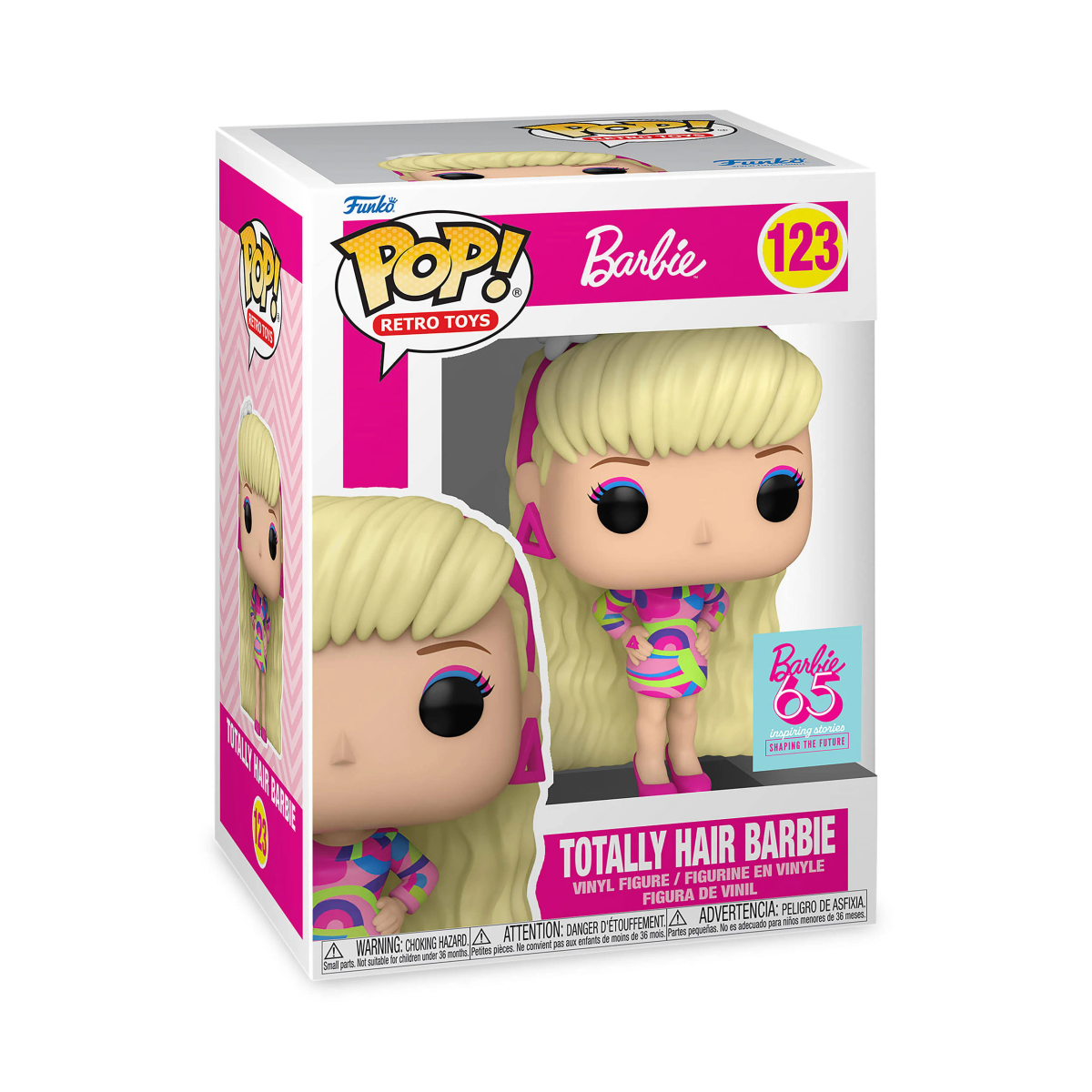 Une boîte Funko Pop de Totally Hair Barbie. La poupée a les cheveux blonds et porte une robe colorée. La boîte est rose et blanche.