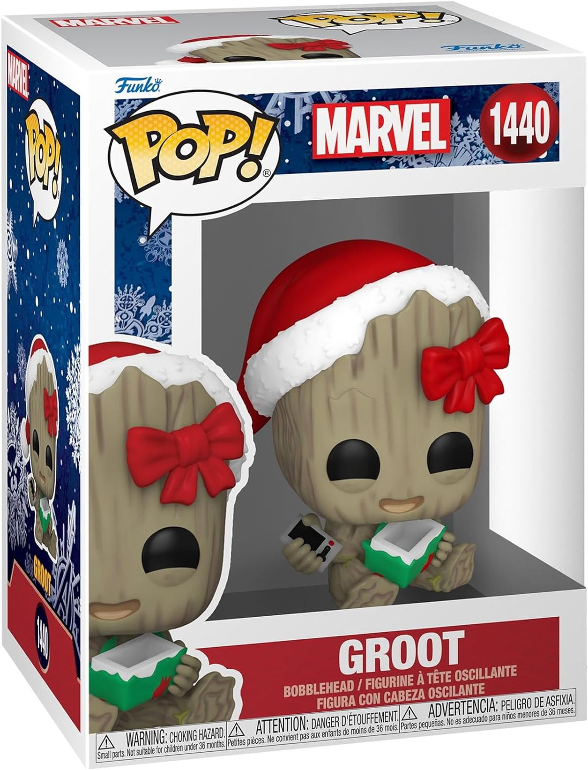 Figura Funko Pop de Groot con gorro de Papá Noel, sosteniendo un regalo. La caja dice Marvel y Groot.