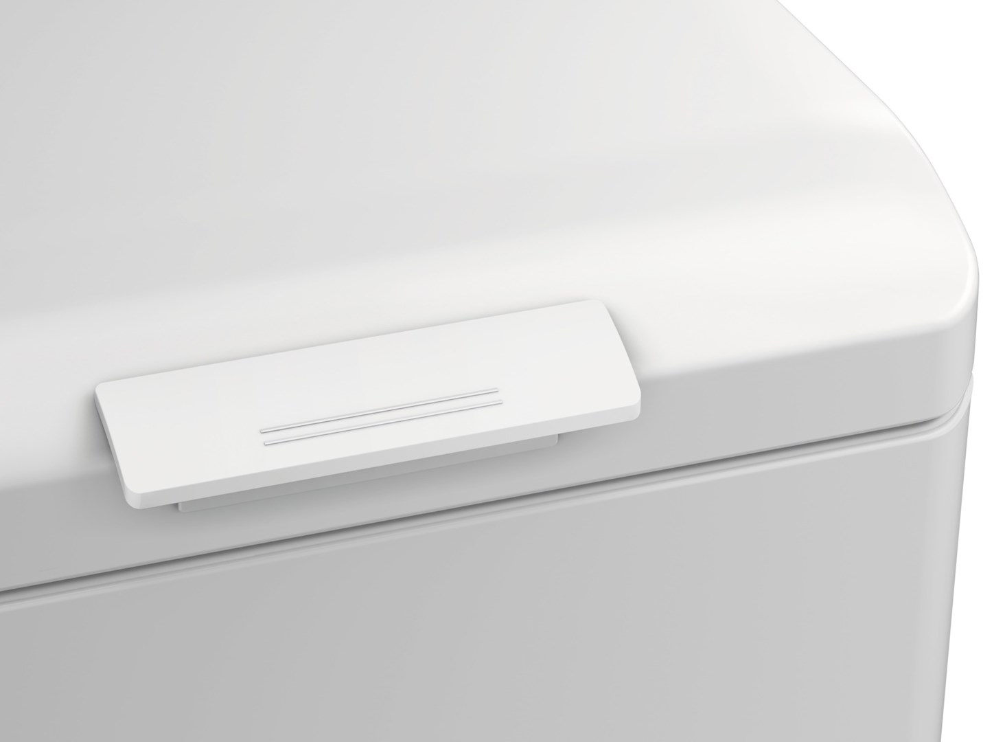 Zbliżenie białej, prostokątnej pokrywy z dwiema równoległymi srebrnymi liniami. Pokrywa znajduje się na białej, zakrzywionej powierzchni.