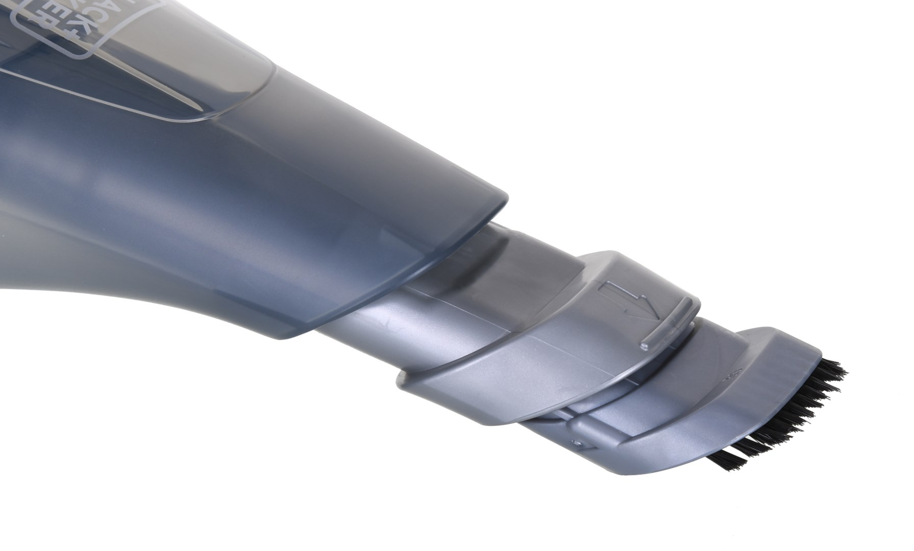 Zbliżenie szarej i czarnej dyszy odkurzacza. Widoczna jest nakładka ze szczotką, z białym tłem.