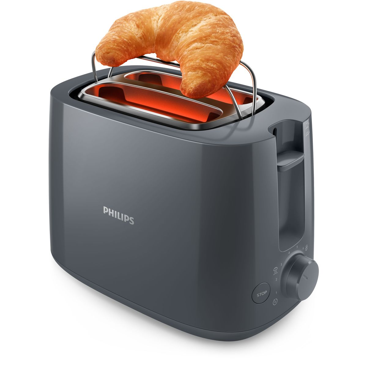 Een grijze Philips broodrooster met een gouden croissant erop. De broodrooster staat op een wit oppervlak.