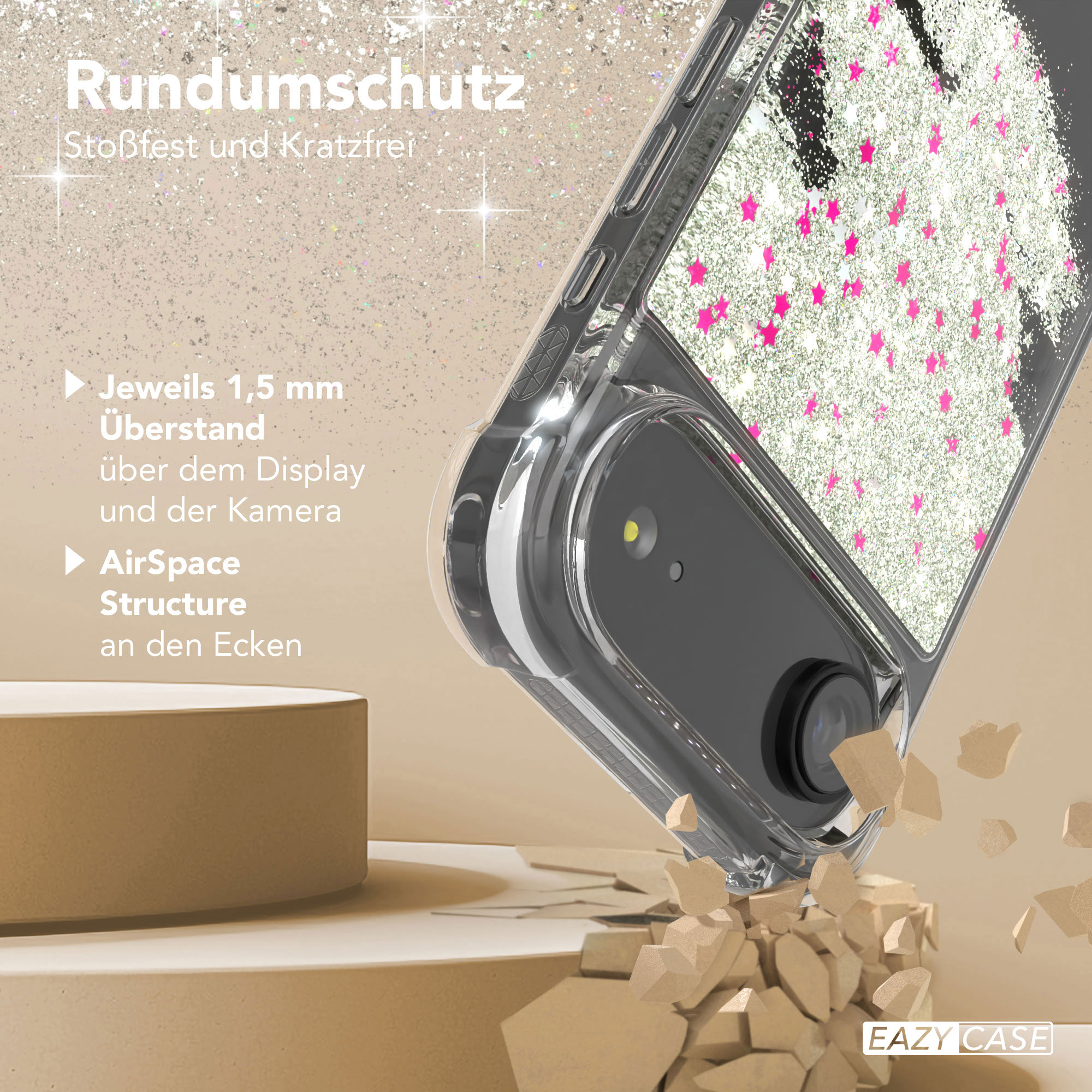Transparente Handyhülle mit rosa Sternen. Die Hülle liegt auf einer beigen Oberfläche mit zerbrochenen Teilen.