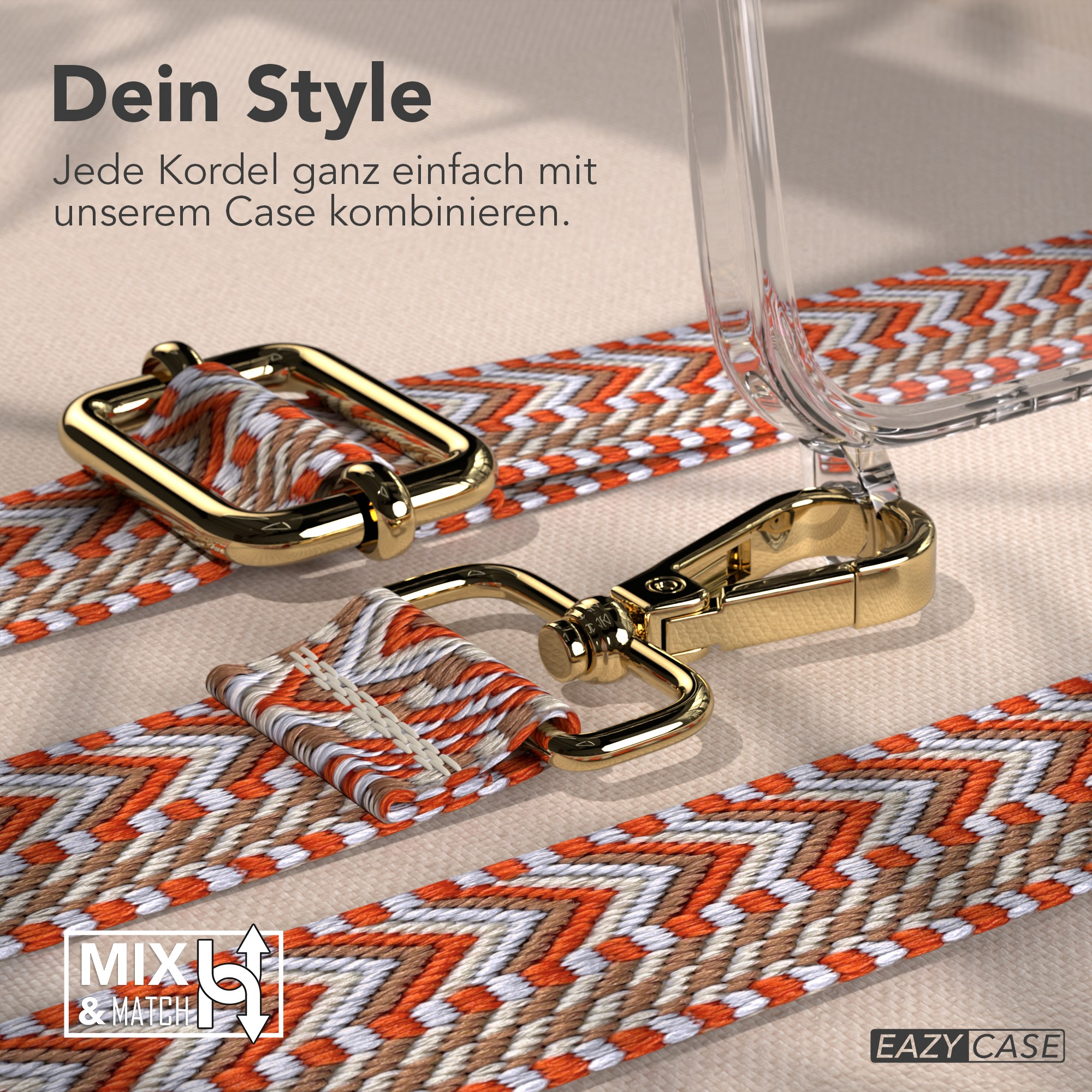 Nahaufnahme eines Telefonriemens mit goldener Hardware und einem gemusterten Riemen in Orange, Weiß und Braun.