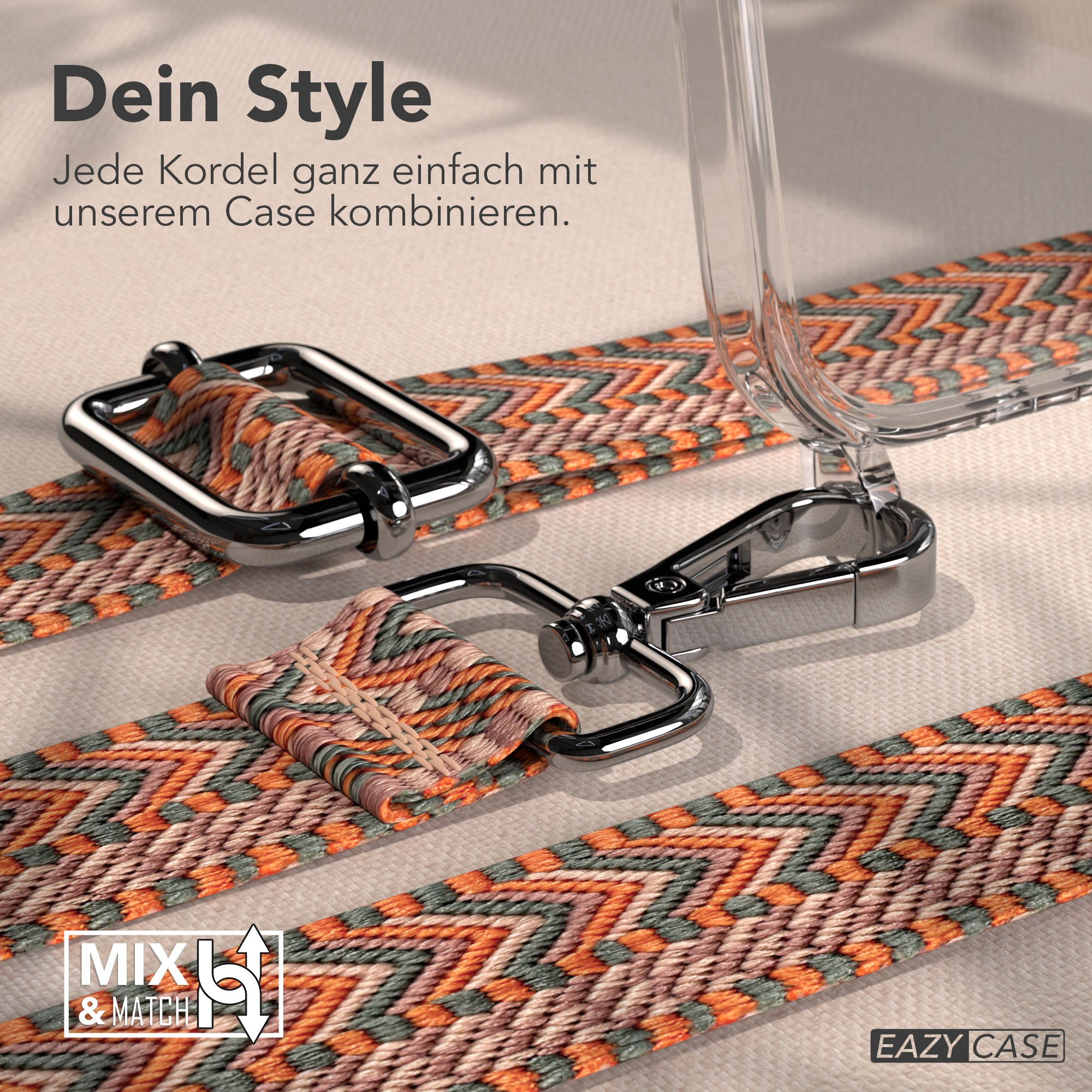 Nahaufnahme eines Riemens mit Metallverschlüssen. Der Riemen ist mit orangefarbenen, grünen und beigefarbenen Zickzackmustern versehen.