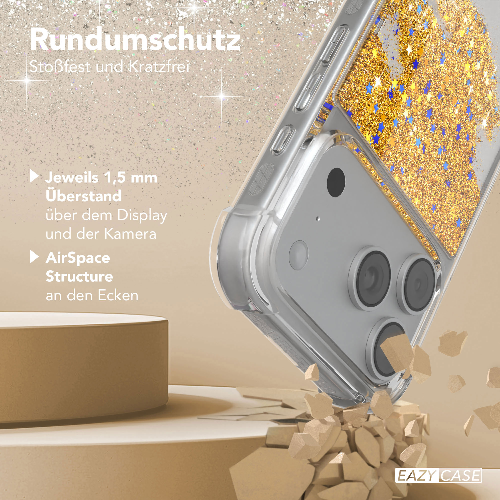 Eine Handyhülle mit Glitzer und Sternen, durchsichtiges Gehäuse, goldener und blauer Glitzer, auf einem Podest und zerbrochenem Beton.