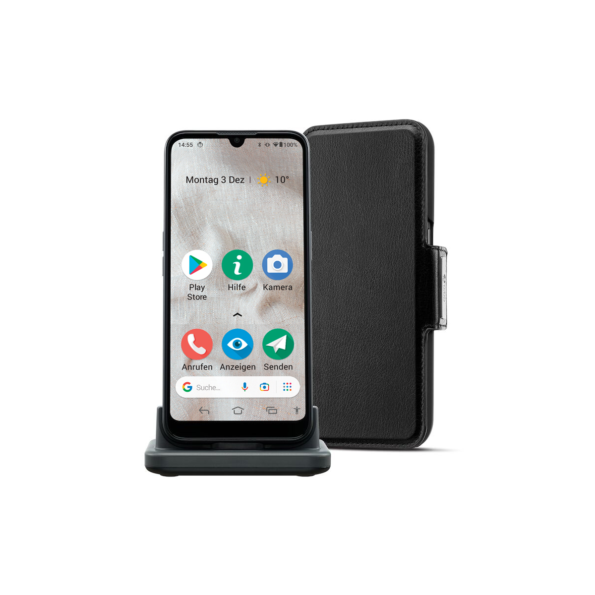 Ein Smartphone auf einer Dockingstation mit einer schwarzen Hülle daneben. Der Bildschirm zeigt Symbole und das Datum.