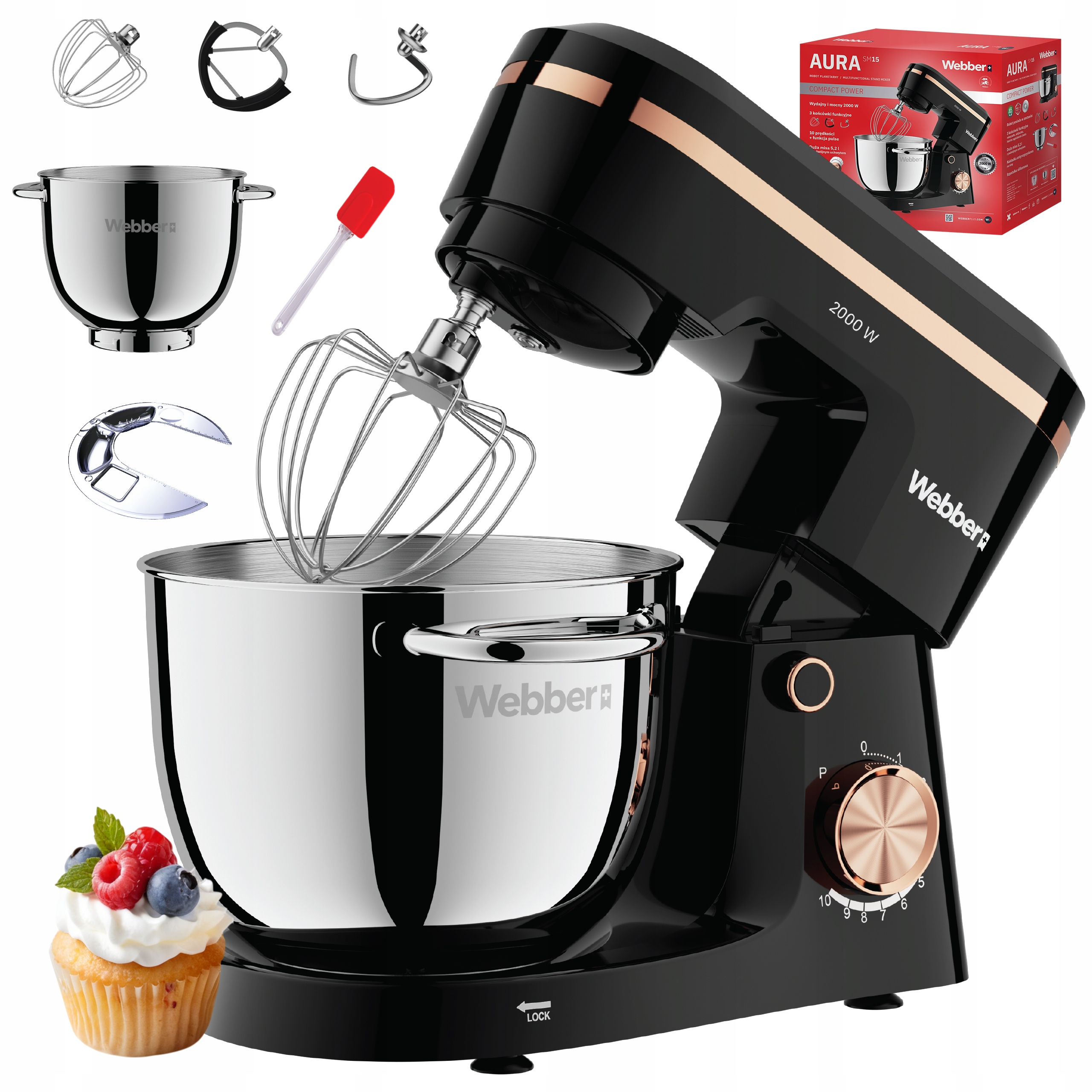 Czarny mikser stojący ze złotymi akcentami, misą i przystawkami, obok babeczki z jagodami.