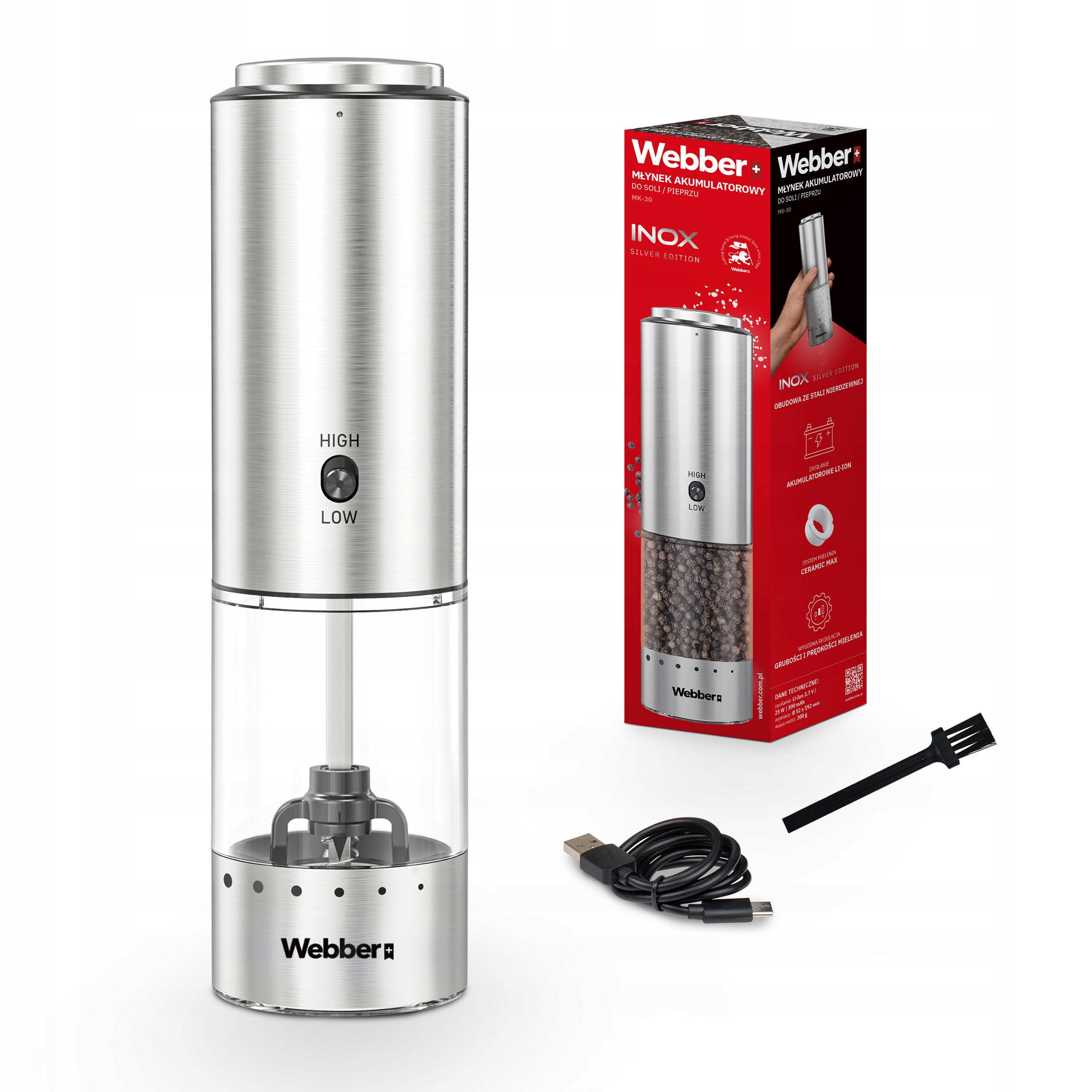 Srebrny elektryczny młynek do pieprzu z czarną szczotką, kablem USB i pudełkiem produktu na białej powierzchni.