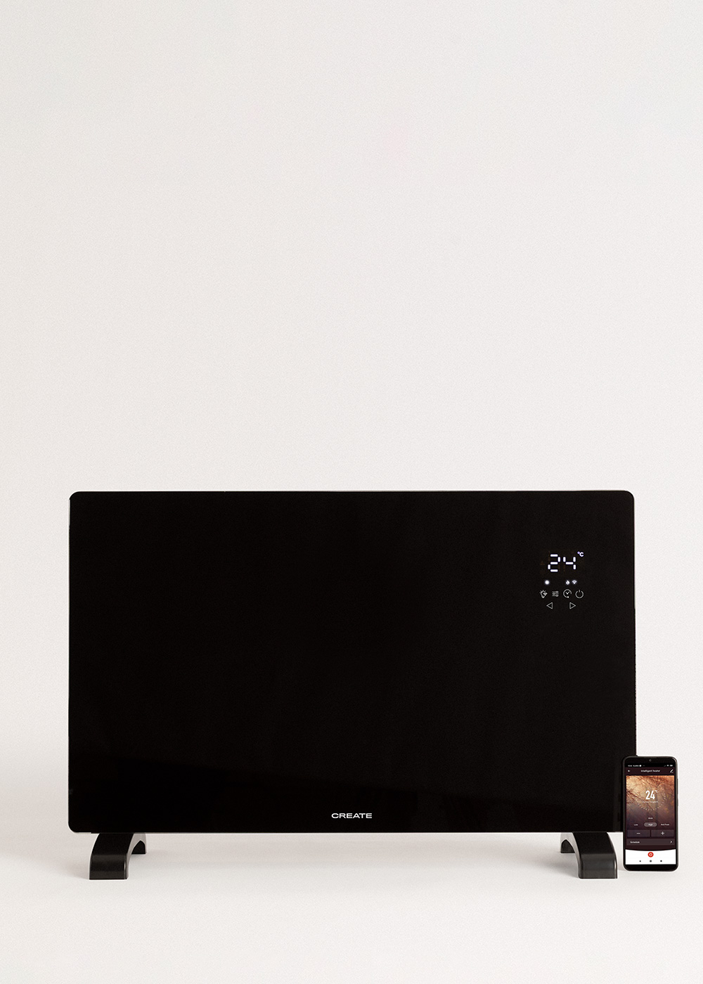 Calentador de panel negro con pantalla digital que muestra 24 grados, un teléfono inteligente con una interfaz similar está al lado.