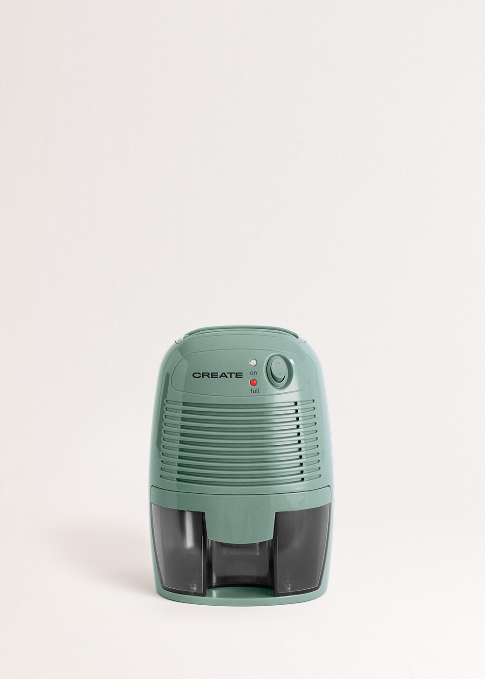 Un deshumidificador verde con un depósito de agua negro. La palabra CREATE es visible. El fondo es blanco.