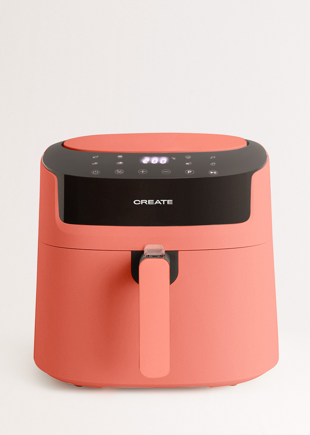 Koralowa frytownica beztłuszczowa z czarnym panelem sterowania wyświetla 200 stopni. Uchwyt znajduje się z przodu. Marka to CREATE.