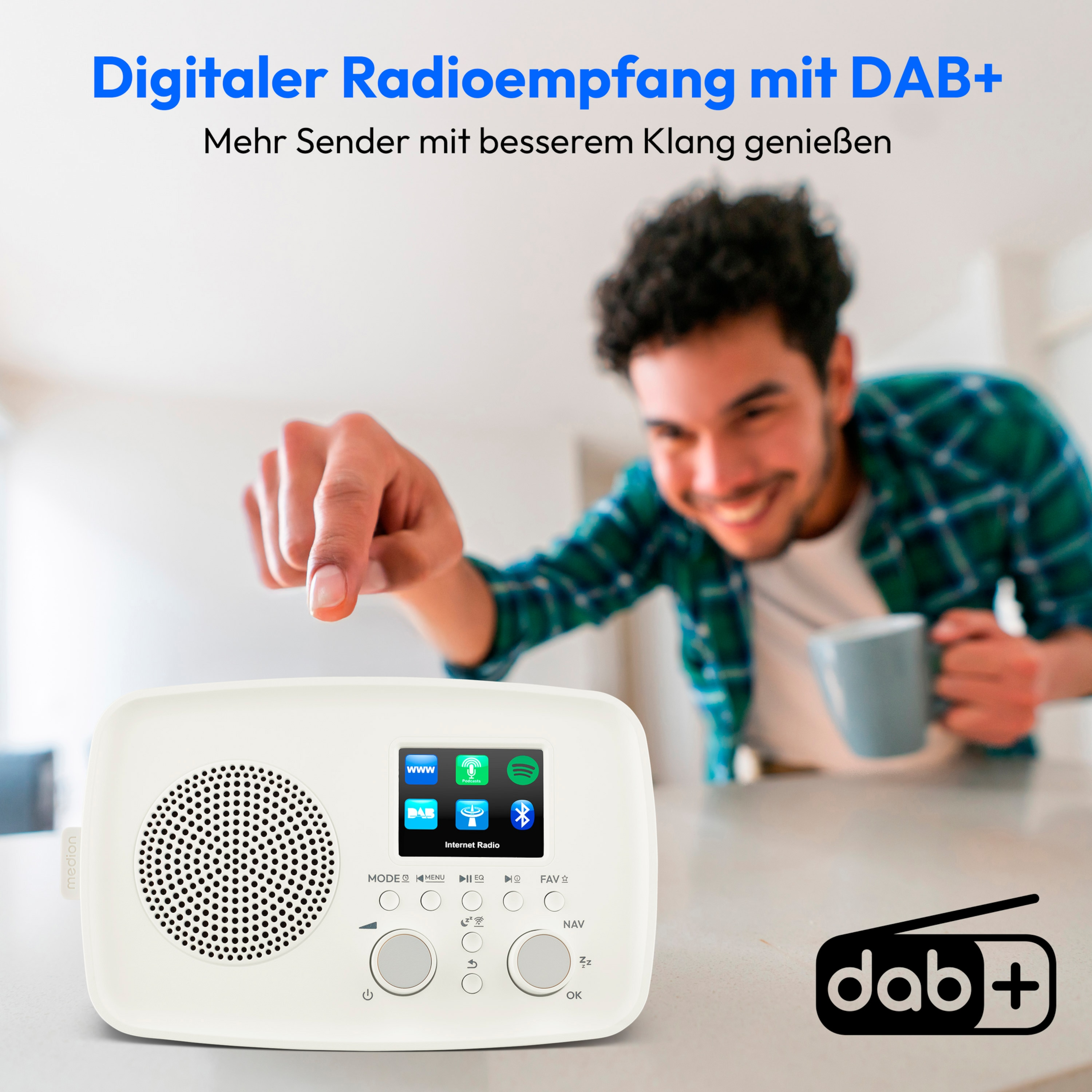 A man points at a white radio with a screen showing app icons. A DAB+ logo is visible.