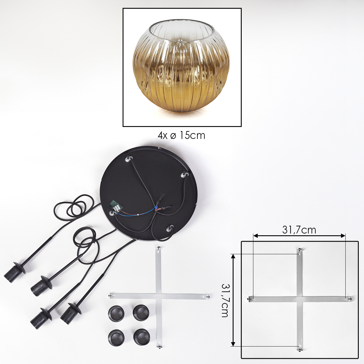 Eine dekorative Lampe mit goldener Glasschale, schwarzem Sockel, vier Lampenfassungen und weiteren Komponenten, alles auf weißem Grund.