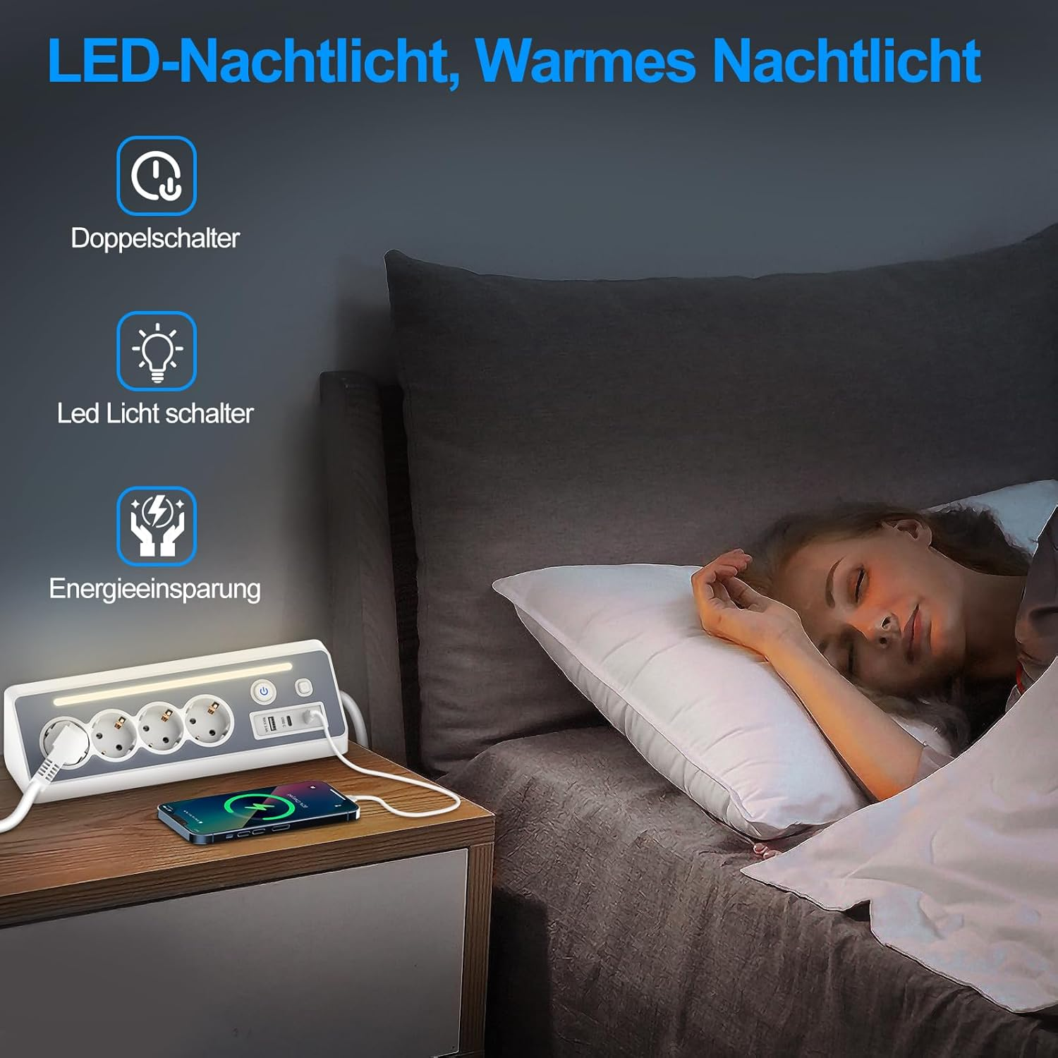 Eine Frau schläft im Bett, ein Nachttisch hat eine Steckdosenleiste und ein Telefon. Text auf Deutsch: LED-Nachtlicht, warmes Nachtlicht.