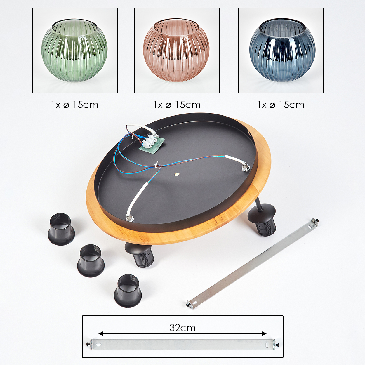 Drei Glasschalen, Leuchtenteile und eine Metallstange. Schalen sind grün, rosa und blau. Teile umfassen eine Holzbasis und schwarze Halter.