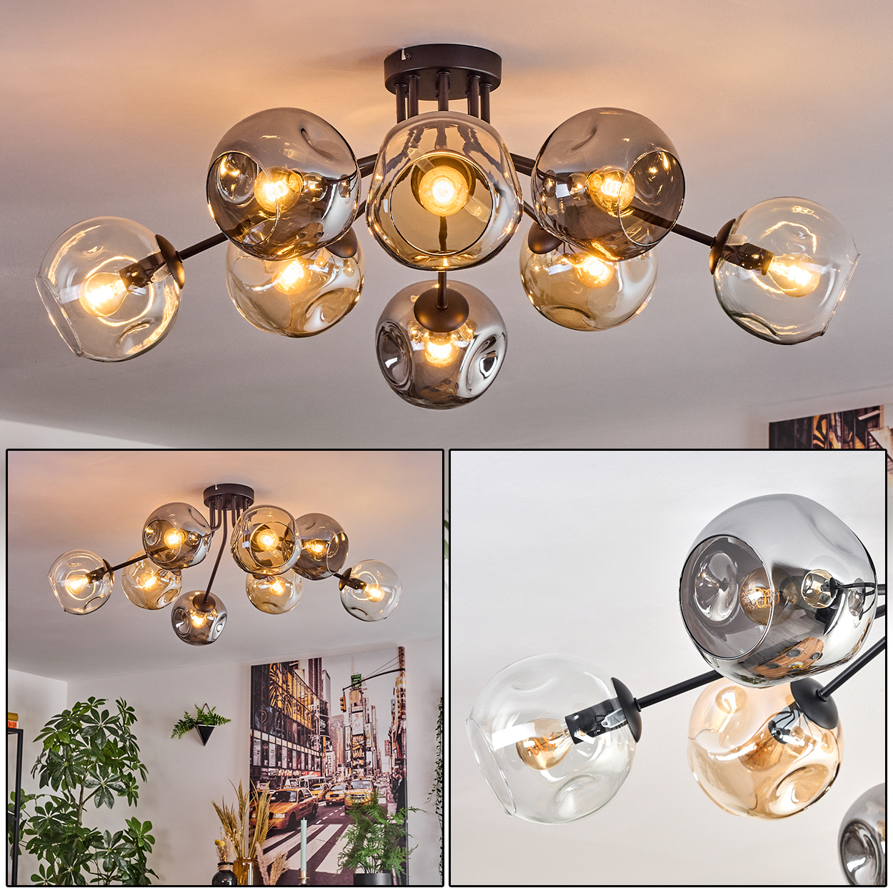 Eine moderne Deckenleuchte mit mehreren Glaskugelschirmen. Die Schirme sind in verschiedenen Grau- und Bernsteintönen gehalten. Die Lichter sind an.