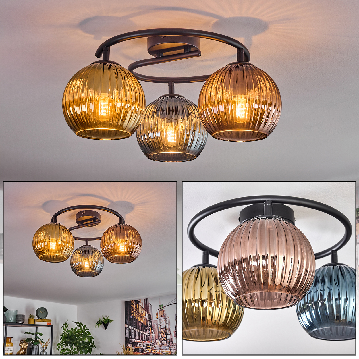Eine moderne Deckenlampe mit vier Glaskugeln in Bernstein, Grau und Blau, vor weißem Hintergrund. Der Rahmen ist schwarz.