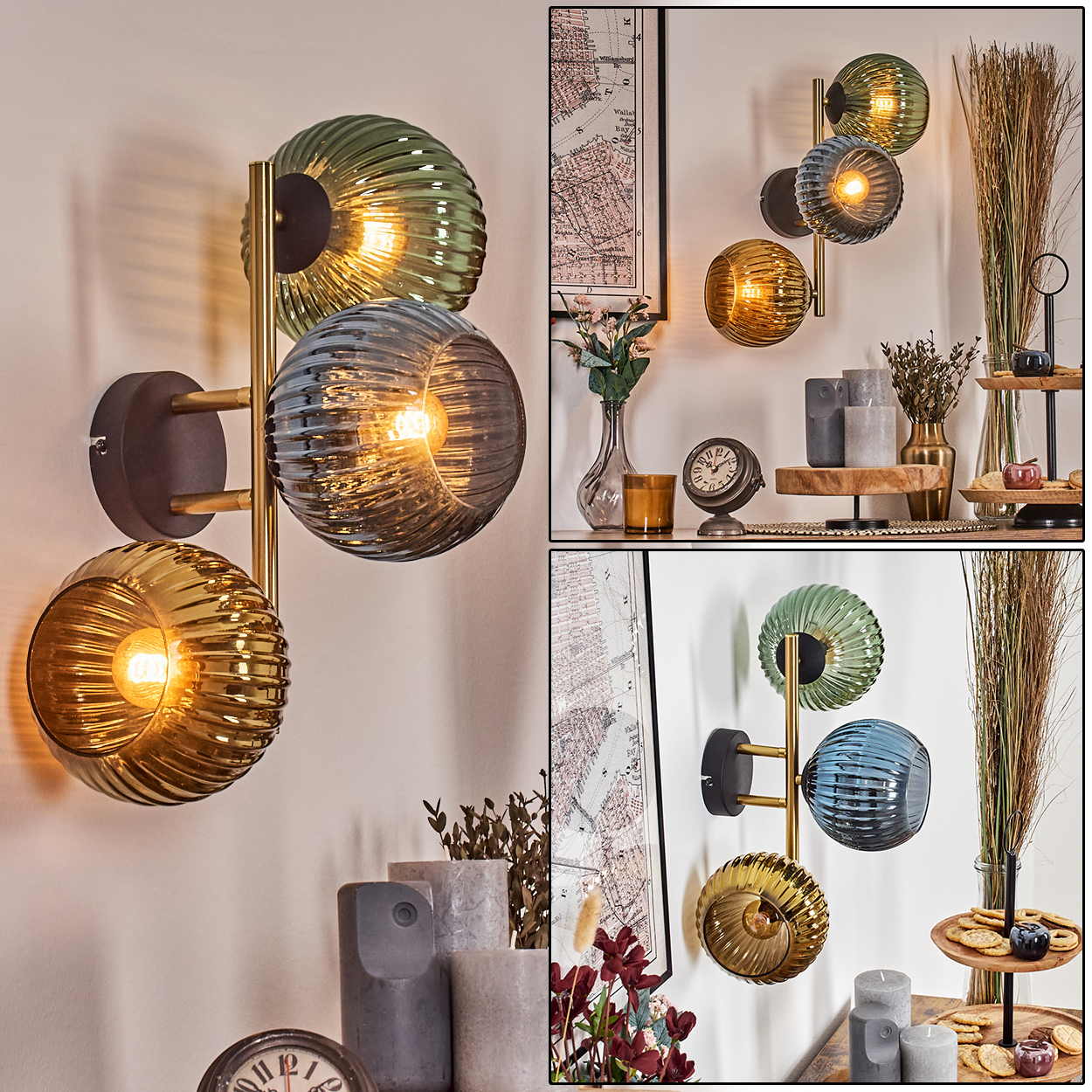 Wandleuchte mit drei farbigen Glasschirmen. Hintergrund mit Deko, Karte und Kerzen.
