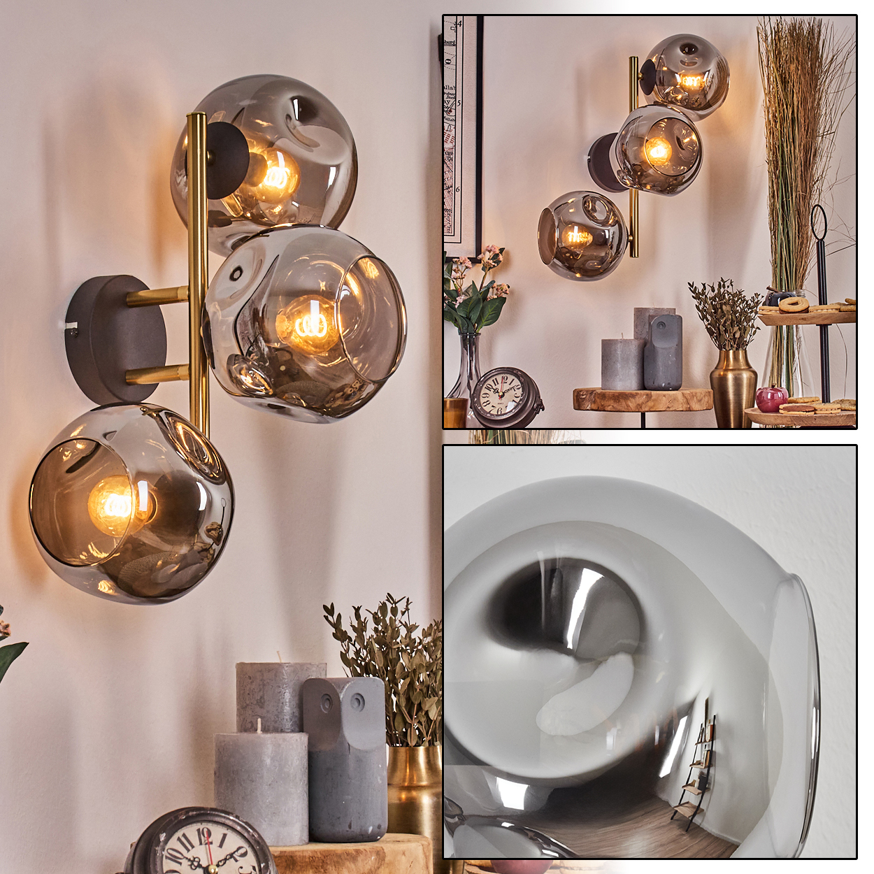 Eine Wandlampe mit drei blasenartigen Glasschirmen. Eine Uhr, Kerzen und Dekorationen befinden sich auf einem Regal darunter.