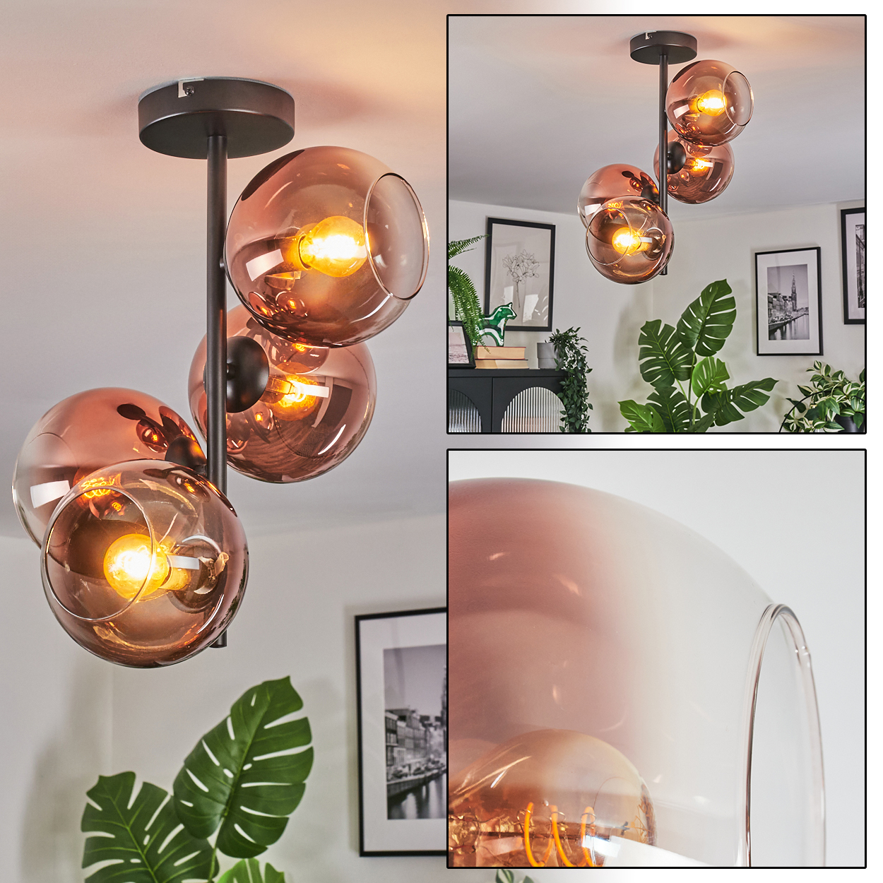 Eine moderne Deckenleuchte mit vier bernsteinfarbenen Glaskugelschirmen. Das Licht ist an und beleuchtet den Raum. Pflanzen und Bilder sind im Hintergrund.