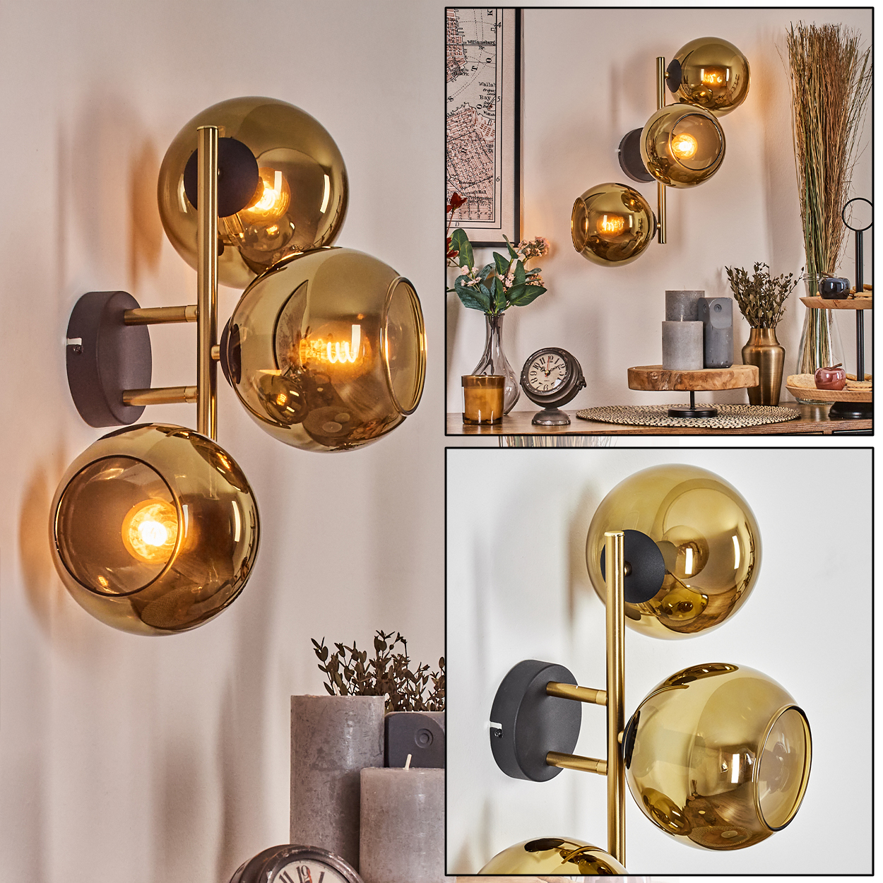 Goldene Kugellampen an einer weißen Wand. Die Lampen haben einen schwarzen Sockel und warmes Licht. Weitere Dekorationen sind Kerzen und eine Uhr.