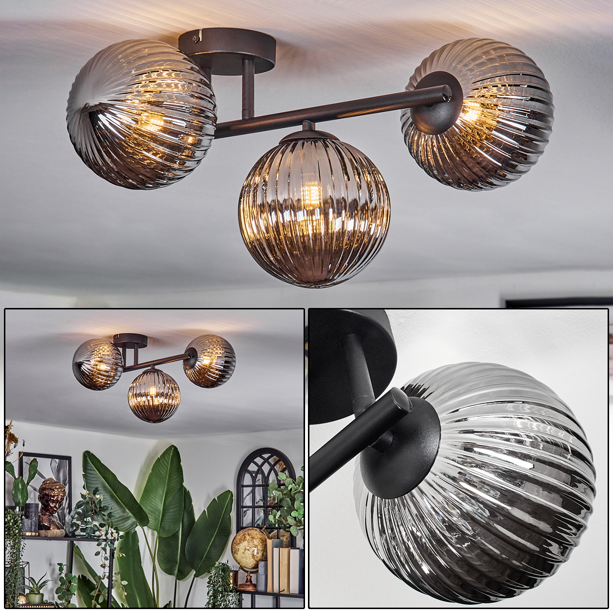 Eine moderne Deckenleuchte mit drei Glaskugeln. Die Kugeln sind gestreift und enthalten eine Glühbirne. Sie sind an einem dunklen Metallrahmen befestigt.