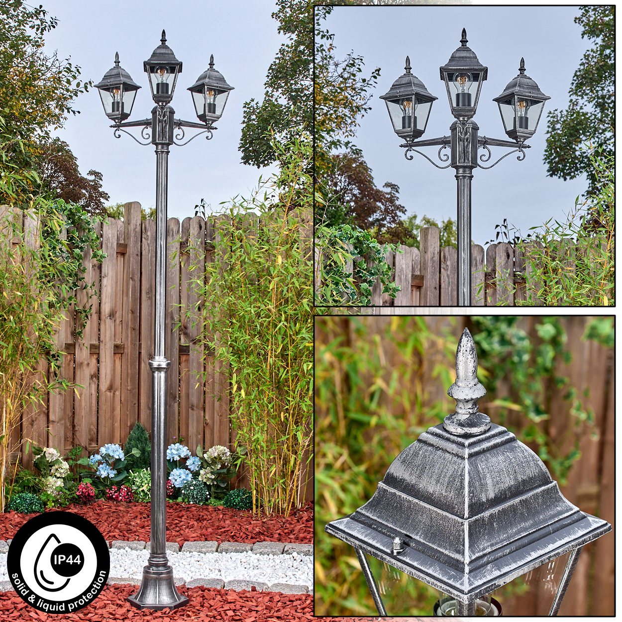 Dekorative Außenlaterne. Sie hat drei Lampen, eine silberne Stange und ist von einem Garten mit Bambus und einem Holzzaun umgeben.