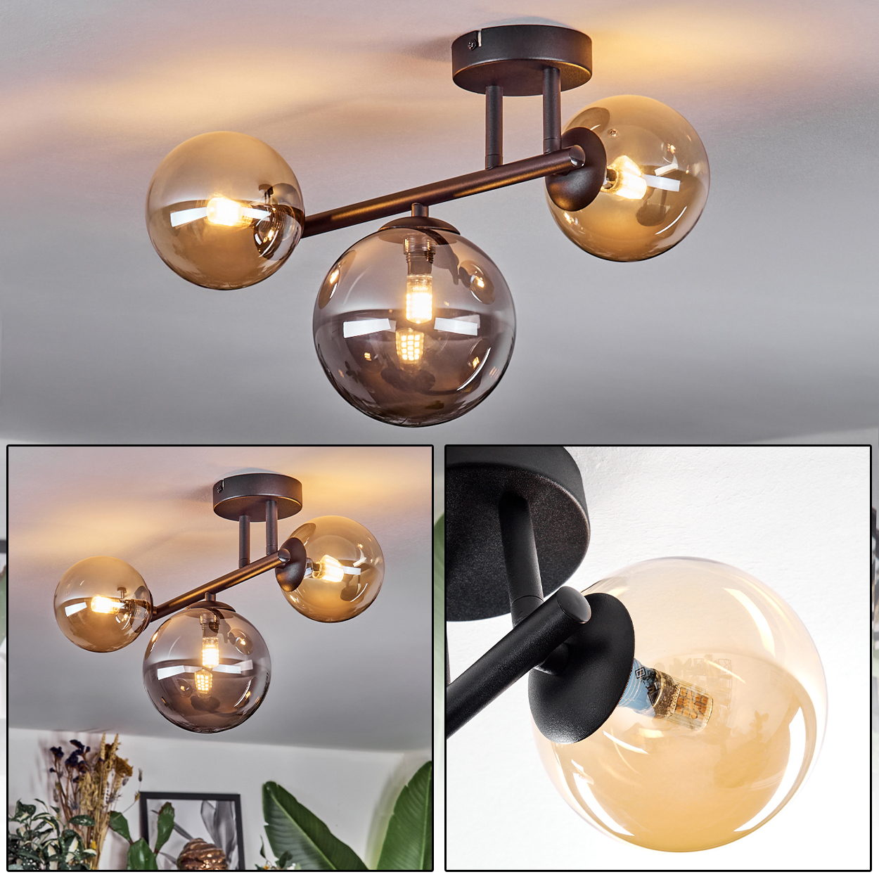 Moderne Deckenleuchte mit drei kugelförmigen Glasschirmen, die jeweils eine Glühbirne enthalten. Die Leuchte ist aus dunklem Metall.