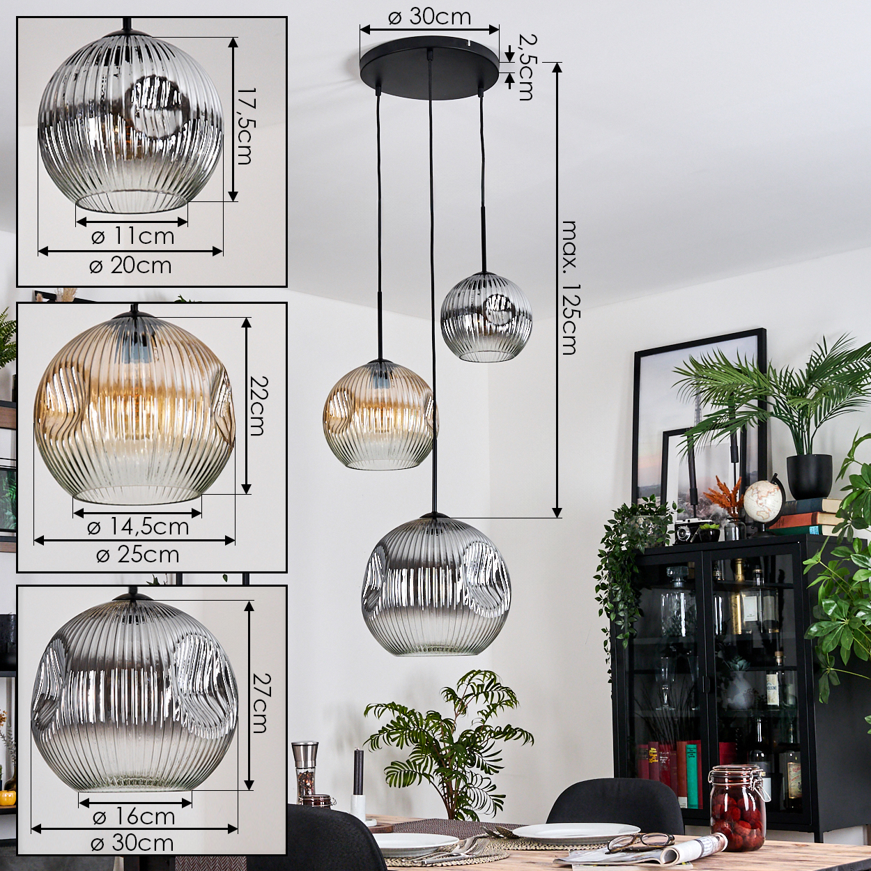 Drei Pendelleuchten mit Glasschirmen hängen über einem Esstisch. Im Hintergrund ein Schrank mit Pflanzen und Dekoration.