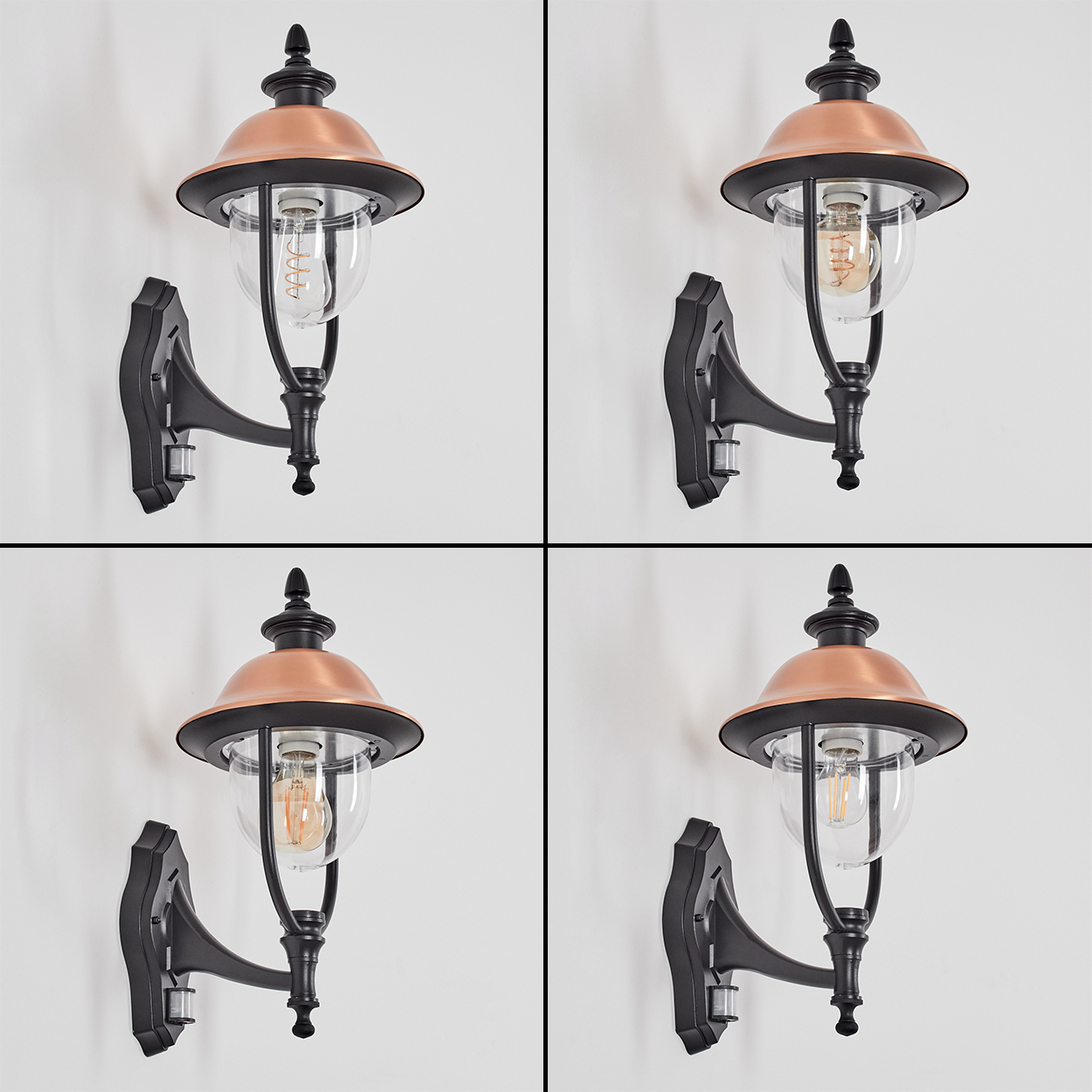 Vier Außenwandleuchten mit Kupferaufsätzen und Glaskugeln. Sie sind an einer weißen Wand befestigt. Die Lampen sind schwarz.