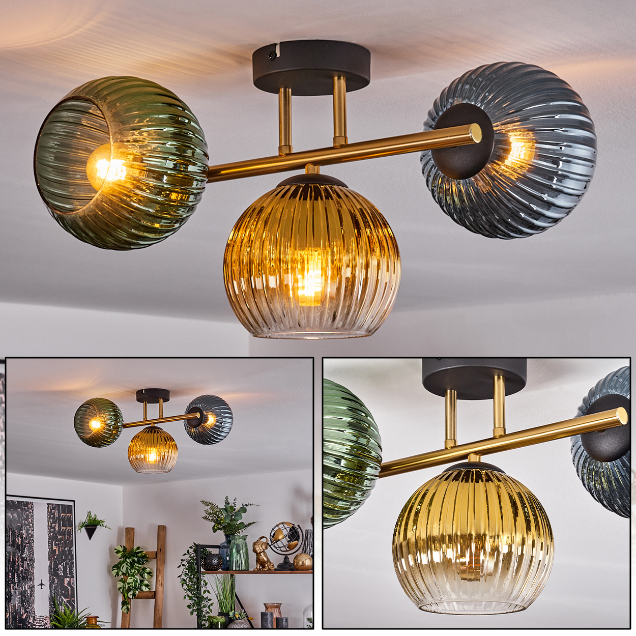 Eine moderne Deckenleuchte mit drei Glaskugeln in Grün, Gold und Grau. Sie ist auf einer schwarzen Basis mit goldenen Armen montiert und strahlt warmes Licht aus.