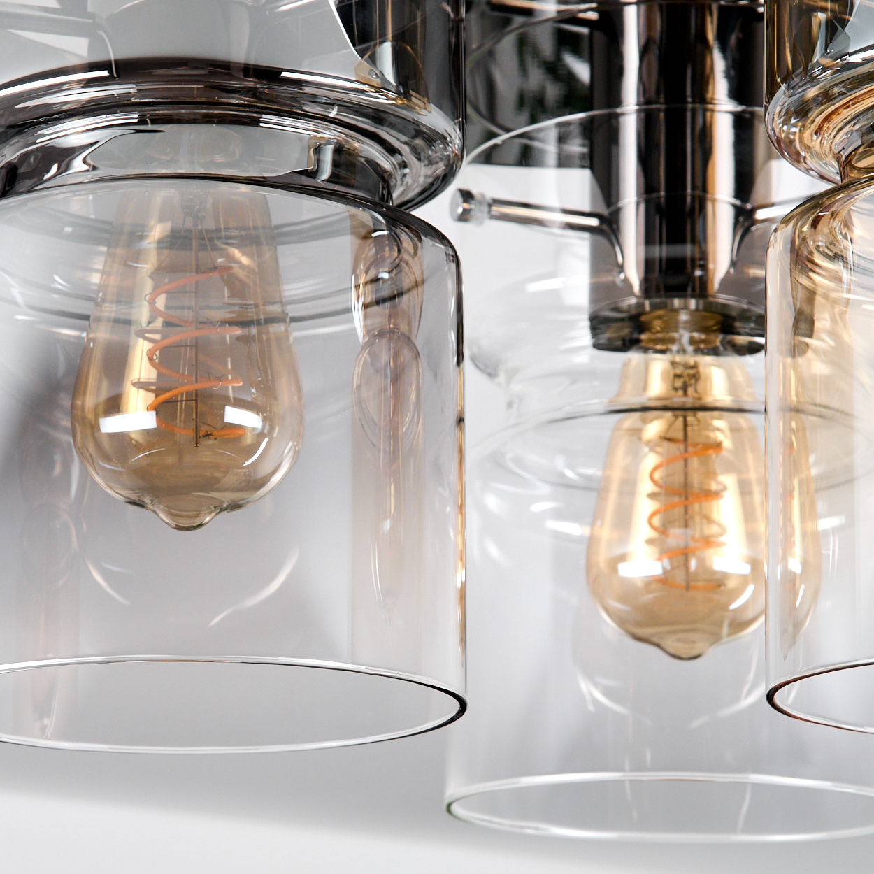 Nahaufnahme einer modernen Leuchte. Klare Glasschirme umgeben Edison-Glühbirnen mit sichtbaren orangefarbenen Filamenten vor weißem Hintergrund.