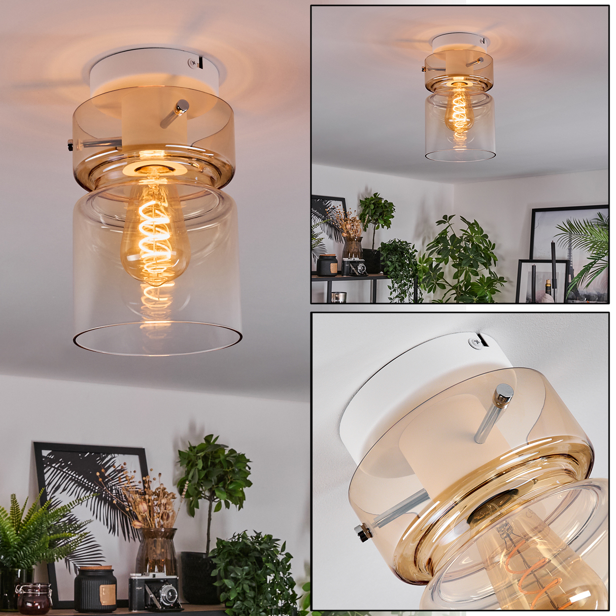 Eine Deckenleuchte mit einer Glühbirne in einem Glaszylinder und einem weißen Sockel. Pflanzen und Dekoration sind im Hintergrund sichtbar.