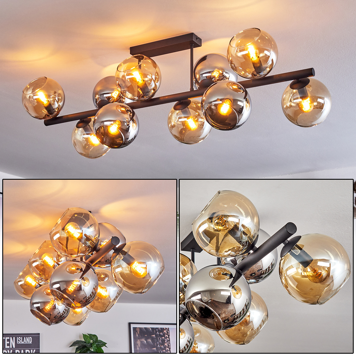 Eine moderne Deckenleuchte mit mehreren Glaskugeln, einige bernsteinfarben und einige verspiegelt, an einem schwarzen Metallrahmen aufgehängt, Lichter sind an.