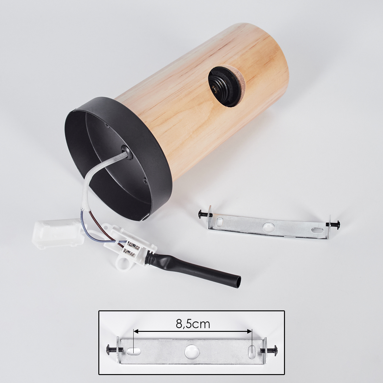 Zerlegte Lampe mit Holzzylinder, schwarzem Metallrand, Drähten und Halterungen. Ein Diagramm zeigt 8,5 cm.