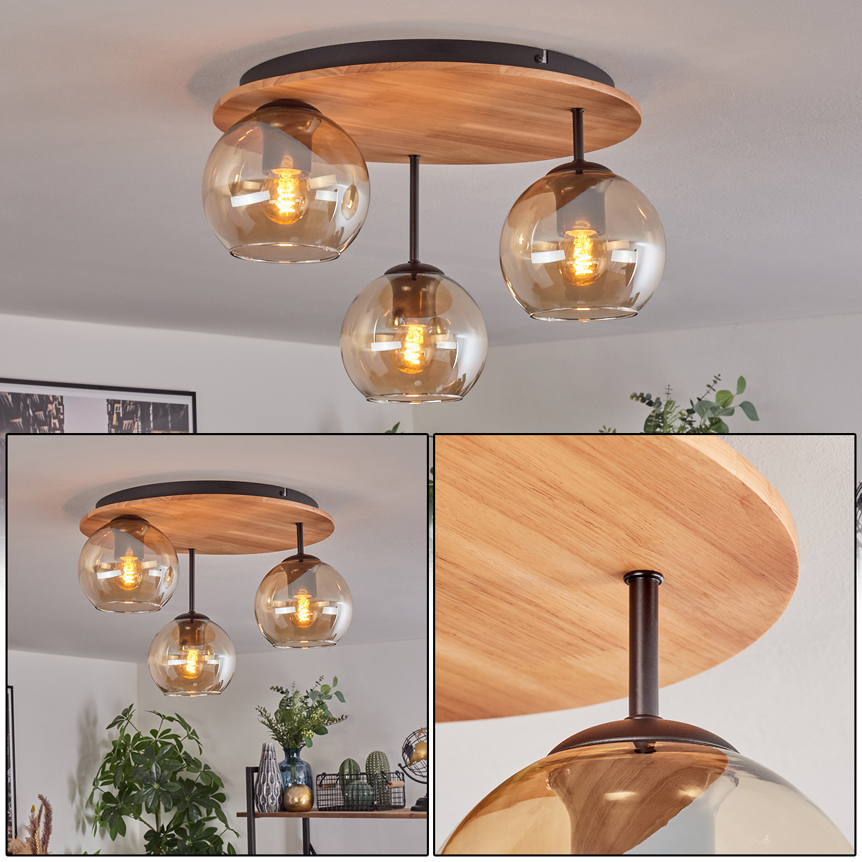Eine moderne Deckenlampe mit drei bernsteinfarbenen Glaskugeln, die von einer Holzbasis hängen. Der Hintergrund zeigt einen Teil eines Raumes.