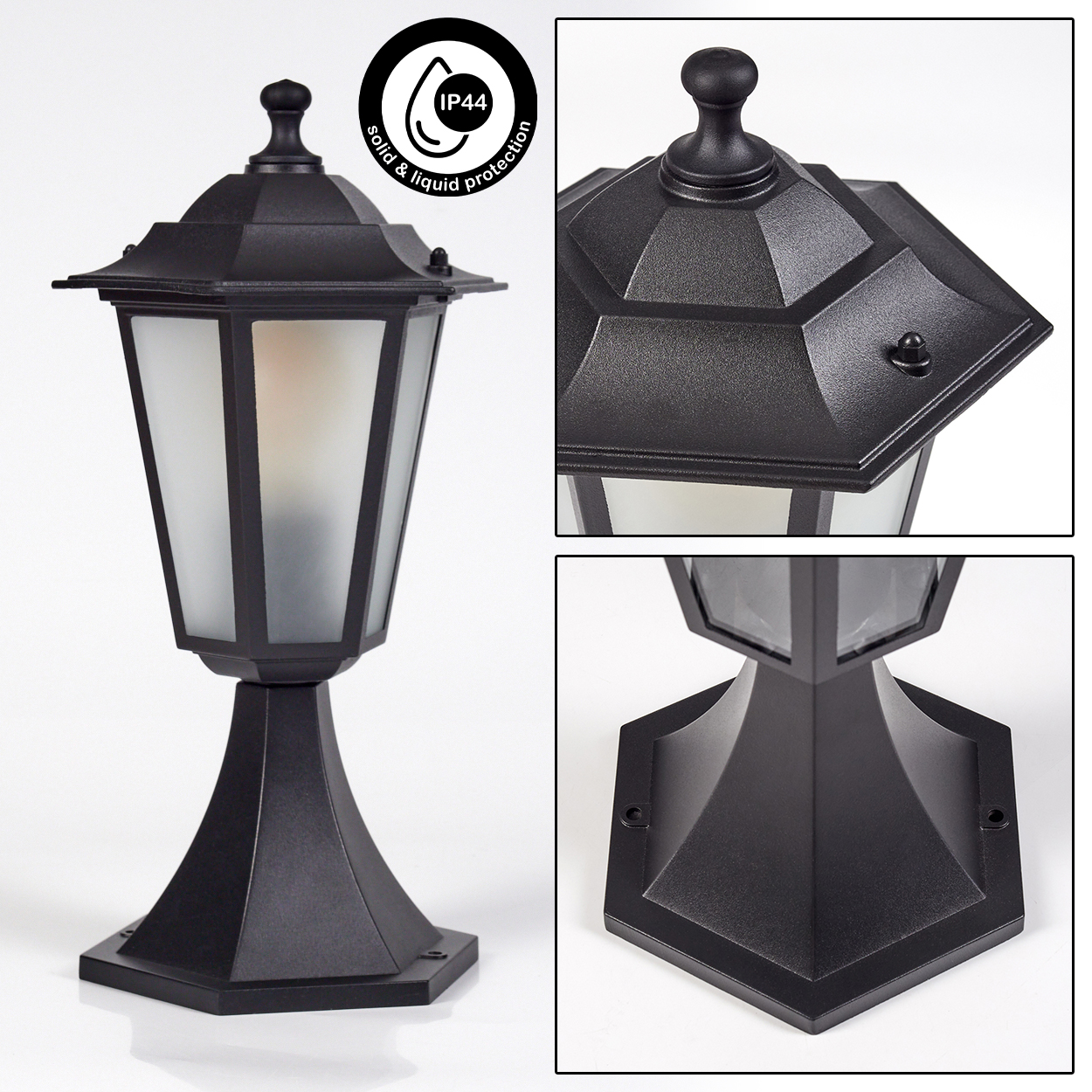 Schwarze Außenlampe mit Milchglasschirm. Sie hat eine dekorative Spitze und steht auf weißem Grund. IP44 Schutz.