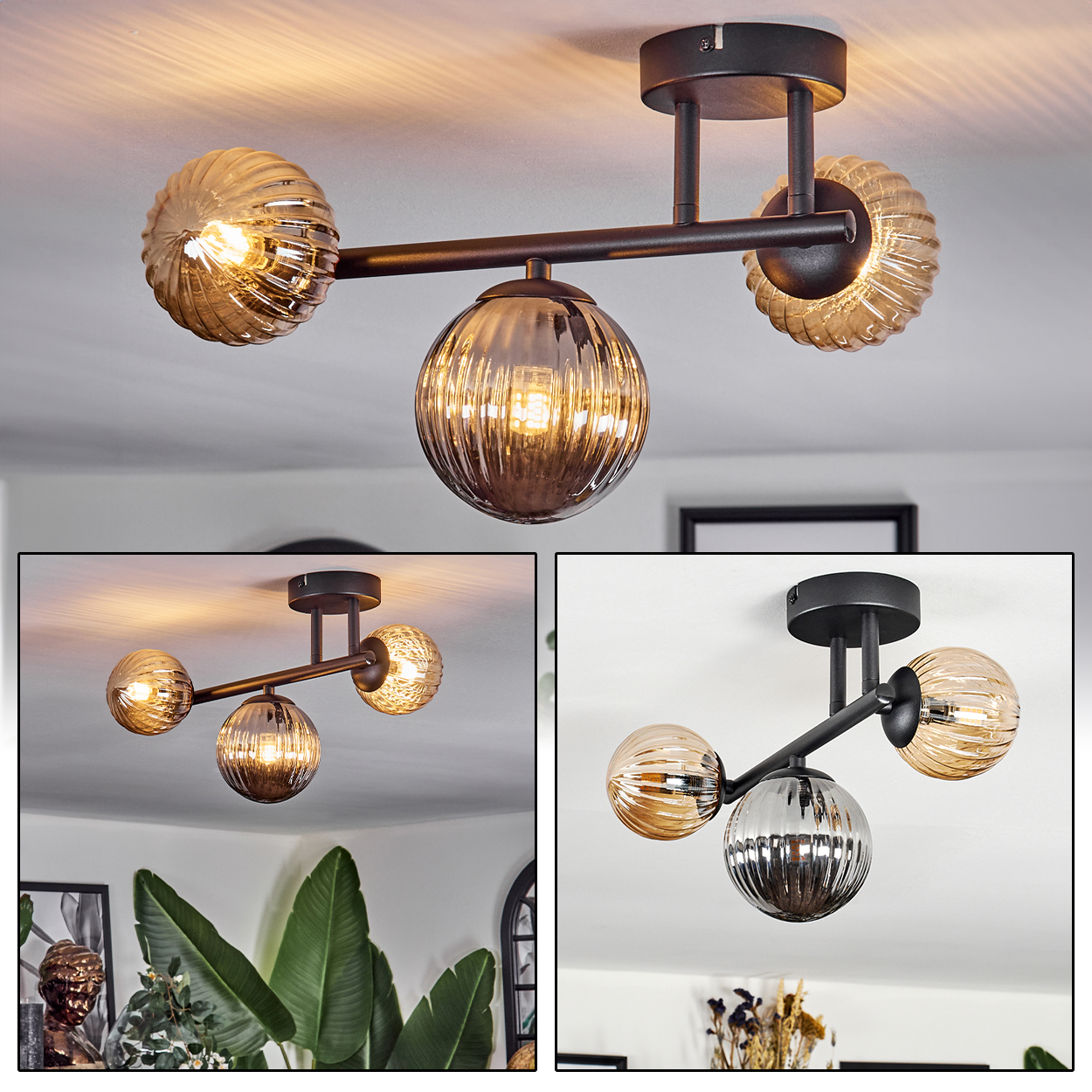 Eine moderne Deckenleuchte mit drei Glaskugeln. Die Kugeln sind bernsteinfarben und klar, mit einem schwarzen Metallrahmen. Das Licht ist an.